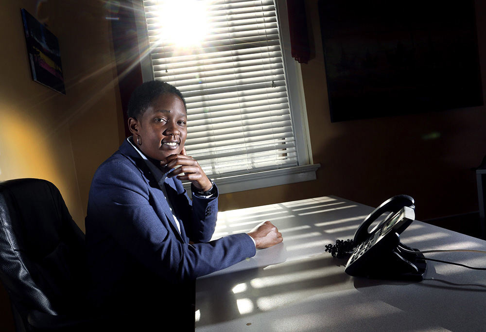 Portrait - 3rd place   - J. Averi Frost in her undecorated office which will be her office as executive director for the new Central Ohio African American Chamber of Commerce. (Eric Albrecht / The Columbus Dispatch)